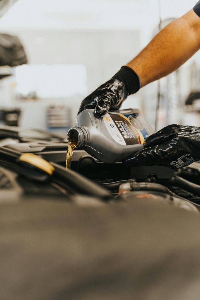 pouring oil in motor